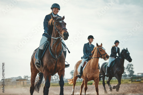 Equestrian, horse riding and sport, women in countryside outdoor with rider or jockey, recreation and speed. Animal, sports and fitness with athlete, group and competition with healthy lifestyle © Kirsten D/peopleimages.com