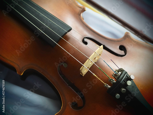 Violin put on background,show detail of acoustic instrument