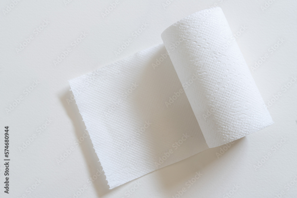 Fototapeta premium Toilet paper roll on white background.
