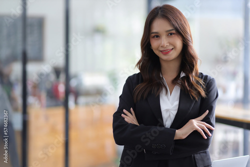 Portrait businesswoman beautiful asian woman in business office. Free Download Portrait businesswoman beautiful asian woman in business office. - GFXLoad