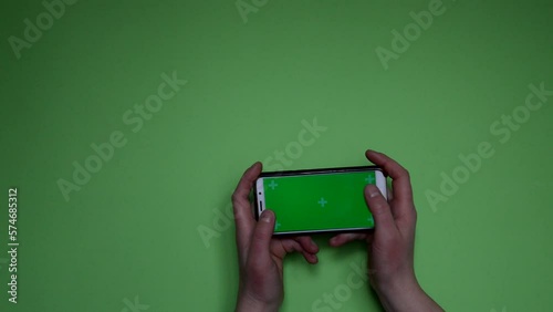 Green Screen Telephoe Hands Green Background. High quality FullHD footage. chroma key photo