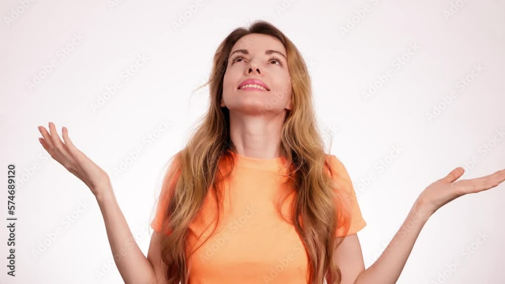 Smiling overjoyed woman nodding yes, winner gesture, say Yes. Positive optimistic happy young 20s lady showing approving gesture, thumbs up, sincere emotions. Success lifestyle body language concept