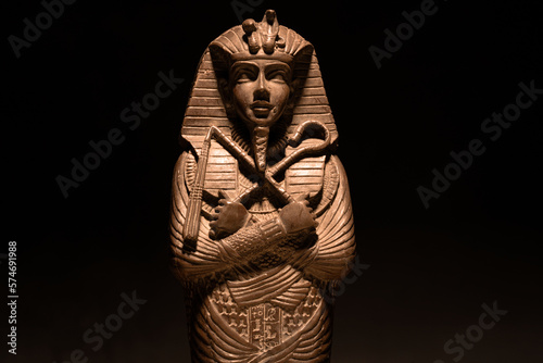 A historical egyptian sarcophagus with a mummy inside photo