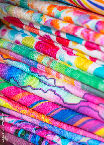 Folded Stack of Rainbow Colored cotton fabric