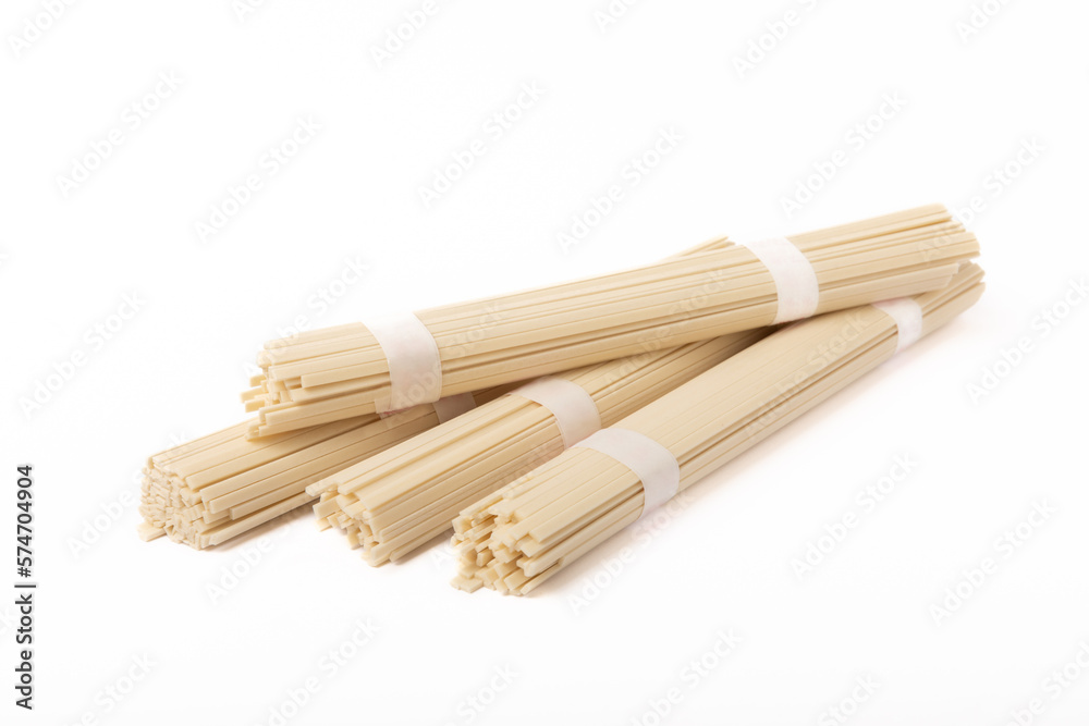 Dried raw rice noodles isolated on white background. Dried raw rice noodles isolated on white background.