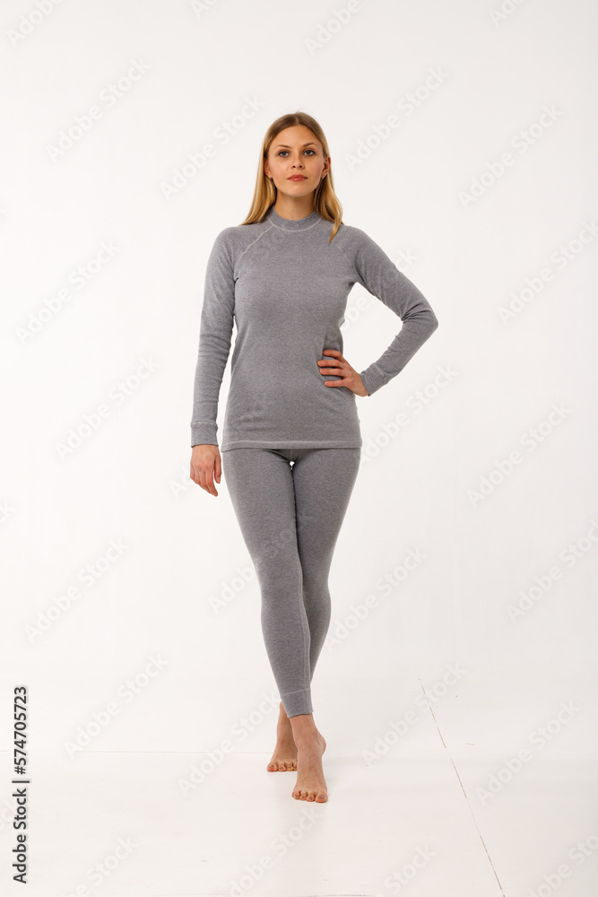 Sporty blonde girl in thermal clothing for women Sporty blonde girl in thermal clothing for women