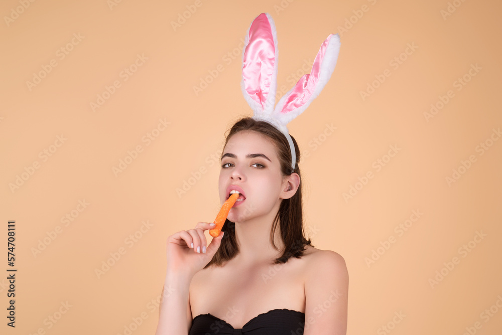 Easter girl. Lovely young woman in rabbit ears celebrating easter holiday, studio background. Holidays party concept. Cheerful girl celebrating Easter in rabbit ears, holding painted eggs. Easter girl. Lovely young woman in rabbit ears celebrating easter holiday, studio background. Holidays party concept. Cheerful girl celebrating Easter in rabbit ears, holding painted eggs.