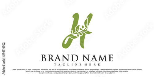 H latter logo design with nature beauty Premium Vector