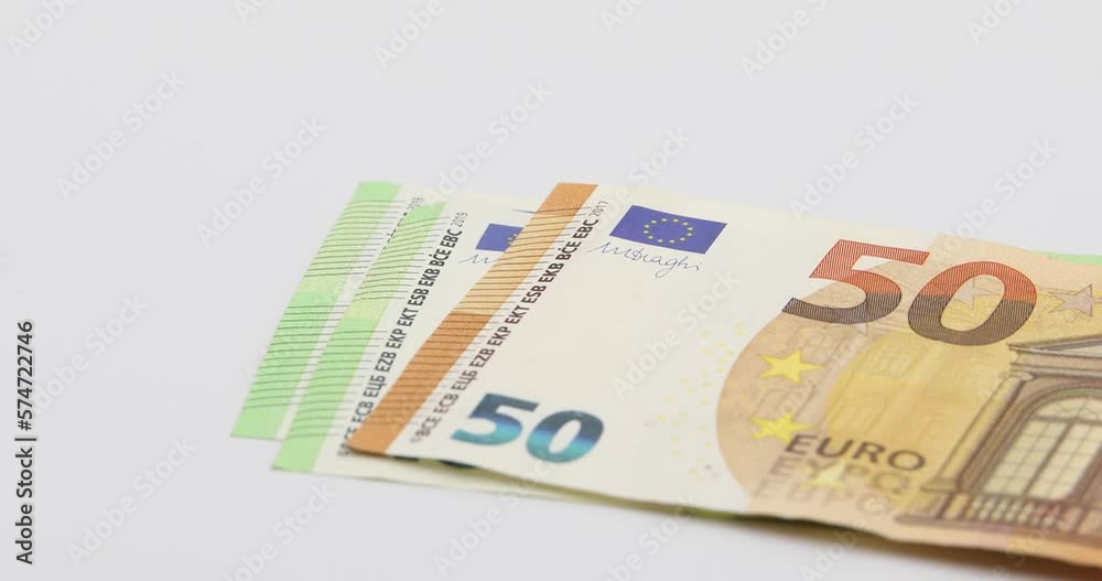 Putting on the white table banknotes of 100, 50, 20, 10 and 5 euros. White background Putting on the white table banknotes of 100, 50, 20, 10 and 5 euros. White background