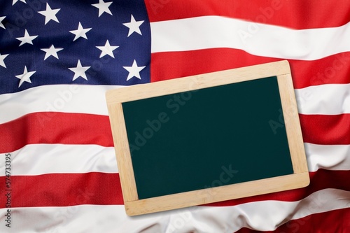 USA flag with blank school blackboard