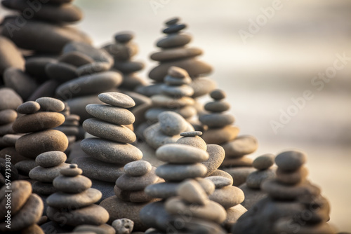 Canvas Print beautiful stack of stones on the ocean