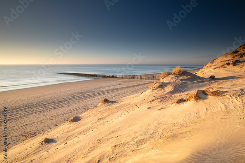 view on sea horizon from sand dune top