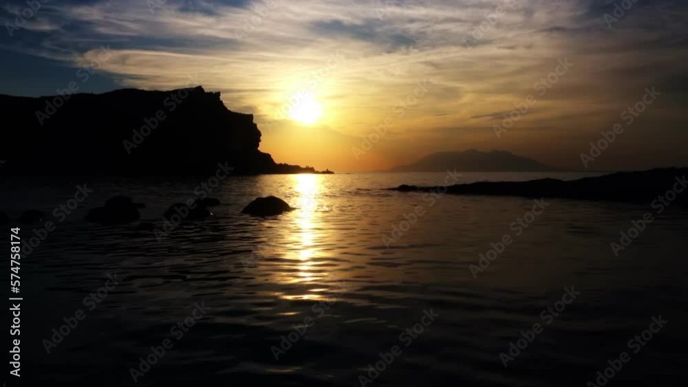 Gokceada, Imbros Island sunset view with mountains sea waves and the opposite island of Samothrace. Arcadia Kardamos district. 4K motion Gokceada, Imbros Island sunset view with mountains sea waves and the opposite island of Samothrace. Arcadia Kardamos district. 4K motion