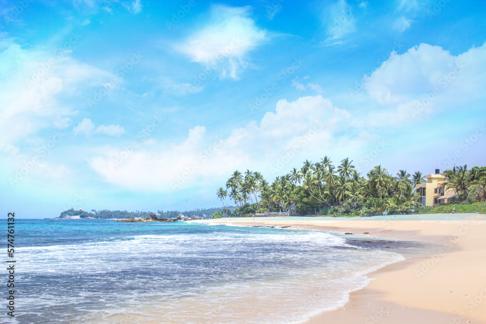 Beautiful view of the tropical beach of Sri Lanka on a sunny day Beautiful view of the tropical beach of Sri Lanka on a sunny day