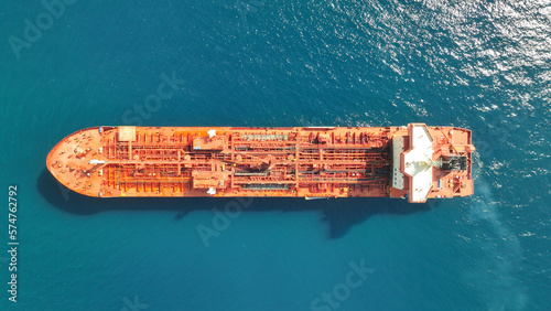 Aerial drone photo of crude oil tanker anchored in deep blue sea