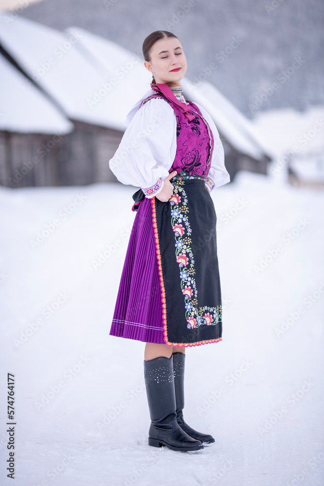 Young beautiful slovak woman in traditional costume. Slovak folklore Young beautiful slovak woman in traditional costume. Slovak folklore