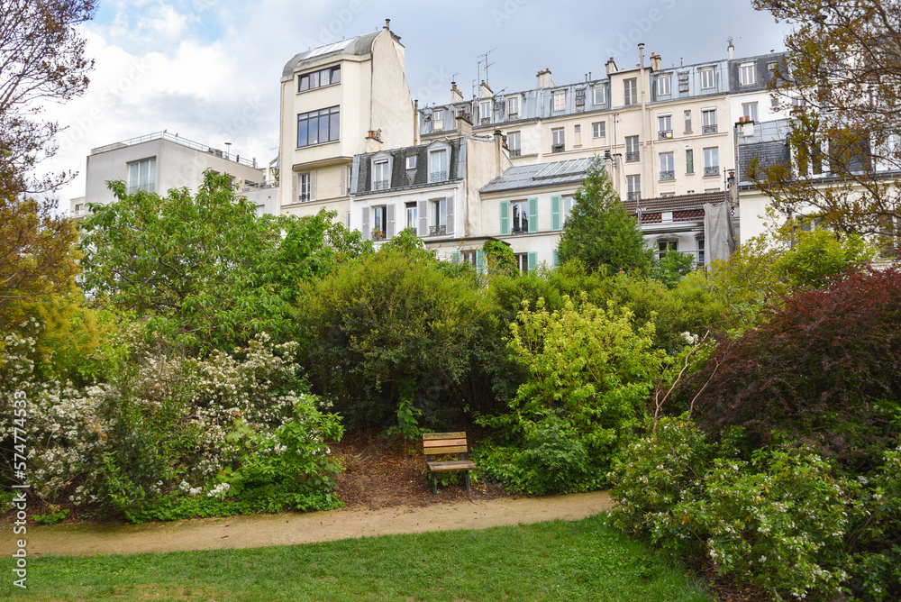 Park and Traditional Parisian Apartment Buildings in Paris, France