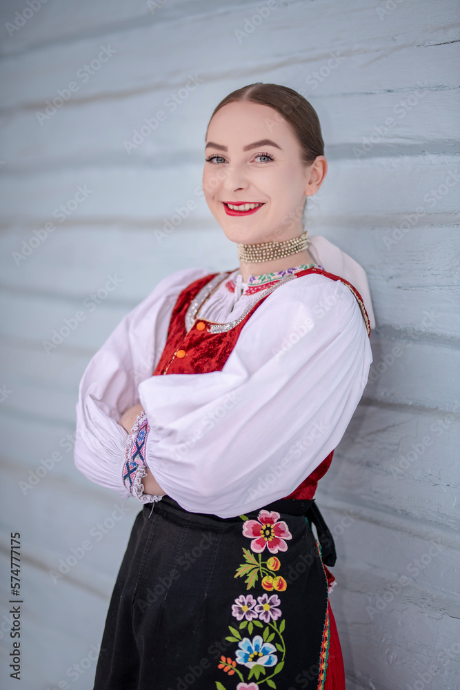 Young beautiful slovak woman in traditional costume. Slovak folklore Young beautiful slovak woman in traditional costume. Slovak folklore