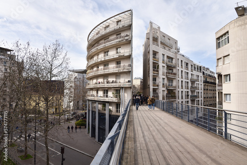 Coulée Verte René-Dumont Walkway Bridge Splitting Apartment Buildings in 12th Arrondissement, Paris, France