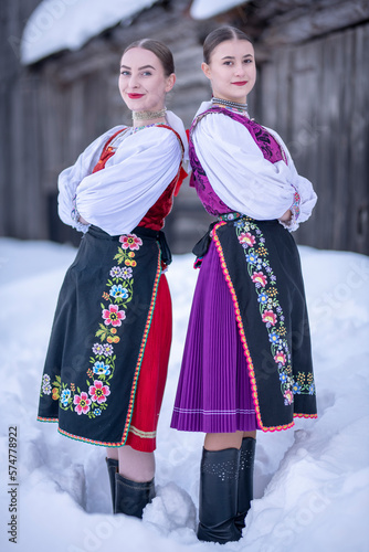 Beautiful woman wearing traditional Eastern Europe folk costumes. Slovak folk costumes.