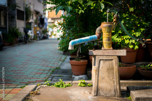 Photography Water well pump in Tokyo downtown shitamachi
