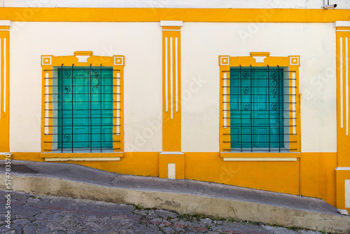 Colorful colonial architecture of historic center of Flores, Guatemala. photo