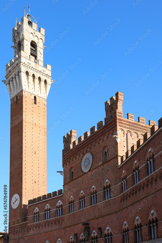 High Bell Tower called TORRE DEL MANGIA in Siena City and town Hall Palace in Italy