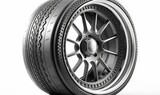  a black tire with a silver rim on a white background with a shadow of the tire on the side of the tire is a white background.  generative ai
