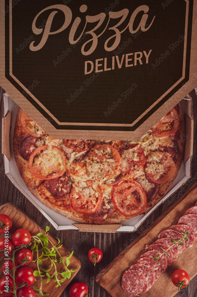 Brazilian pizza with mozzarella, salami, tomato and parmesan cheese in