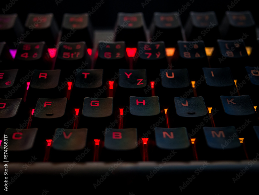 Color backlit gaming keyboard glows in the dark