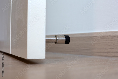 Cuadro en lienzo White door with door stopper