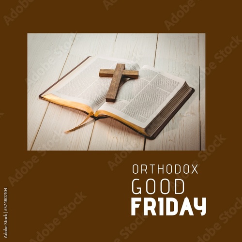 Composite of orthodox good friday text and bible with cross on table over brown background