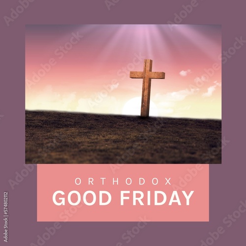 Composite of orthodox good friday text and wooden cross on land with sunrays over purple background