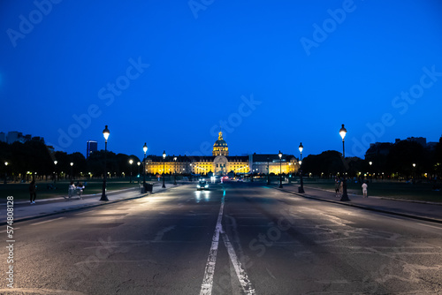 Illuminated Church Dome Of Les Invalides In The Night In Paris  France