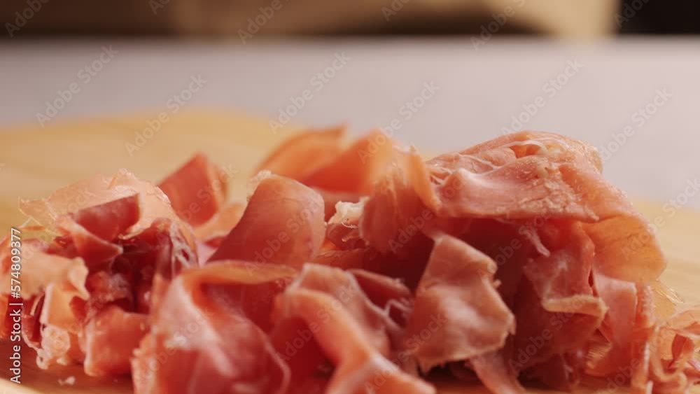 Jamon iberico tapas close up, chef cooking the best spanish ham pork tapas, cafe with traditional food. Jamon iberico tapas close up, chef cooking the best spanish ham pork tapas, cafe with traditional food.