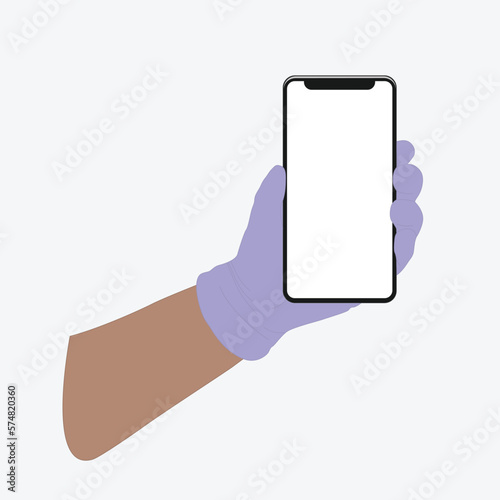 Mobile phone in a man's hand, hand in a medical, rubber glove.