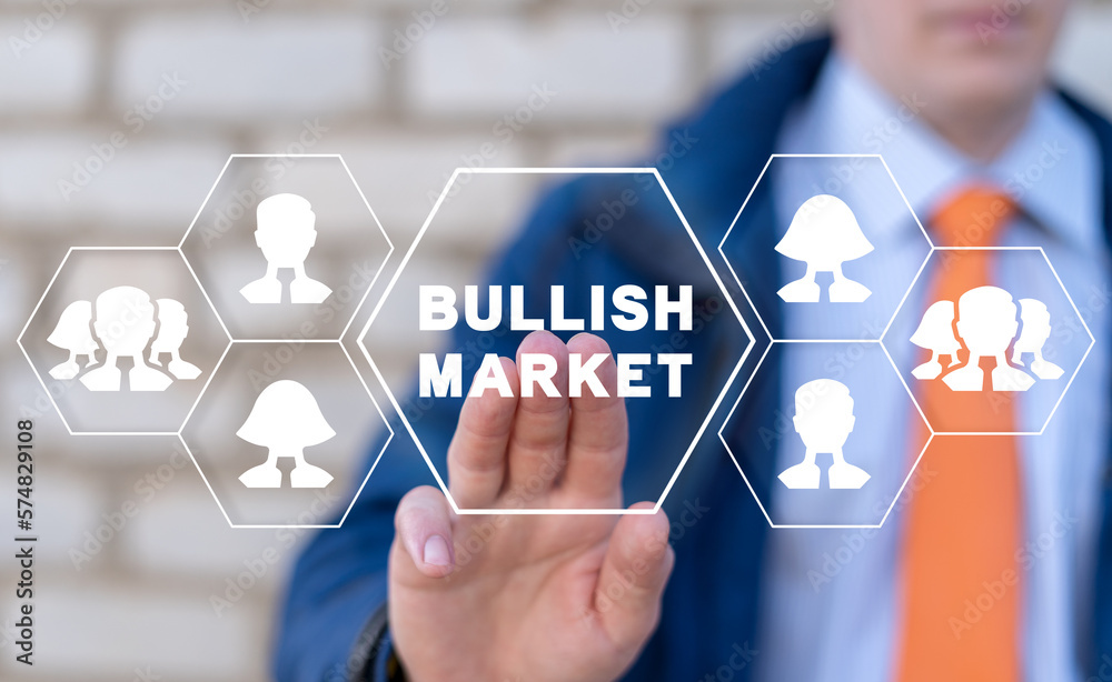 Trader working on virtual touch screen of future and sees inscription: BULLISH MARKET. Concept of bullish stock marketing. Financial investment. Bull market. Trader working on virtual touch screen of future and sees inscription: BULLISH MARKET. Concept of bullish stock marketing. Financial investment. Bull market.