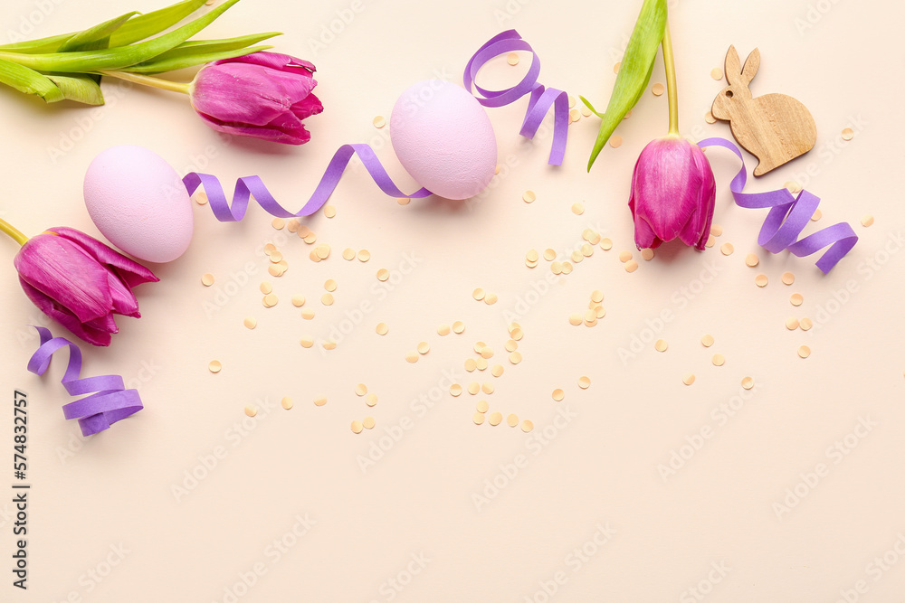 Composition with Easter eggs, tulip flowers and confetti on color background