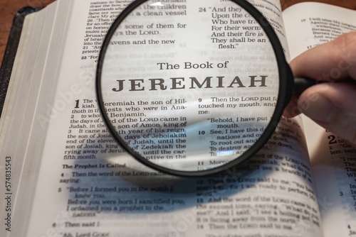 title page book of Jeremiah close up using magnifying glass in the bible or Torah for faith  christian  hebrew  israelite  history  religion  christianity  Old Testament