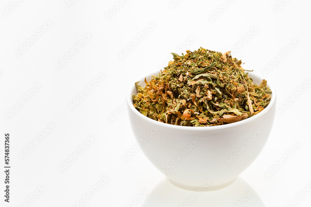 Dried leaves of epazote in the bowl - Dysphania ambrosioides Dried leaves of epazote in the bowl - Dysphania ambrosioides