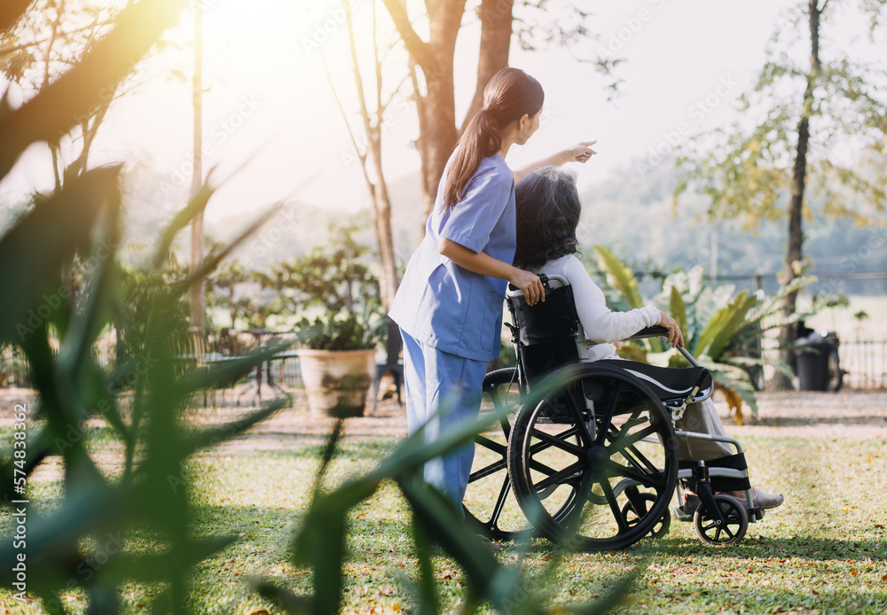 Ταπετσαρία Asian young caregiver nurse support senior older male walking outdoors