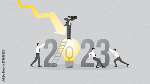 Global recession in the year 2023. A vision businessman uses binoculars on big light bulb with a team, down graph. Business idea, problem-solving for financial crisis, economic downturn and inflation.