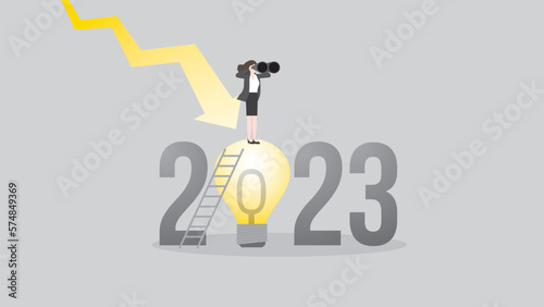 Global recession in the year 2023. A visionary businesswoman uses binoculars on a big light bulb, a down graph. Business ideas, problem-solving for financial crisis, economic downturn, and inflation.