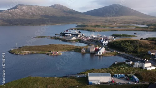 Cinematic drone shot of Lochmaddy, showing the Lochmaddy to Uig ferry run by Caledonian Macbrayne. Filmed on North Uist in the Outer Hebrides of Scotland. photo