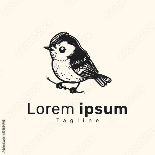 Black and white hand-drawn cute bird logo template. A black bird sitting on a branch, logotype. photo