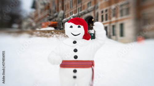 Selective focus photo of Bonhomme, the official snowman representative of the Québec Winter Carnival.