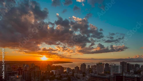 Spectacular sunset time-lapse in Vancouver, BC taken from downtown high rise roof top. photo