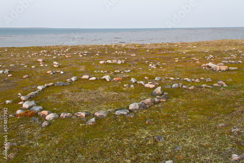 Remains of several Inuit tent rings along the coast of Hudson Bay north of Arviat at a place called Qikiqtarjuq, Nunavut, Canada