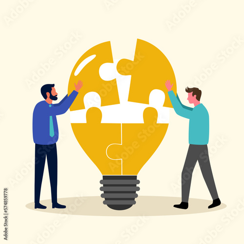 Business teamwork building lightbulb in flat design. Connect the jigsaw pieces into lightbulb. Business idea and solution.