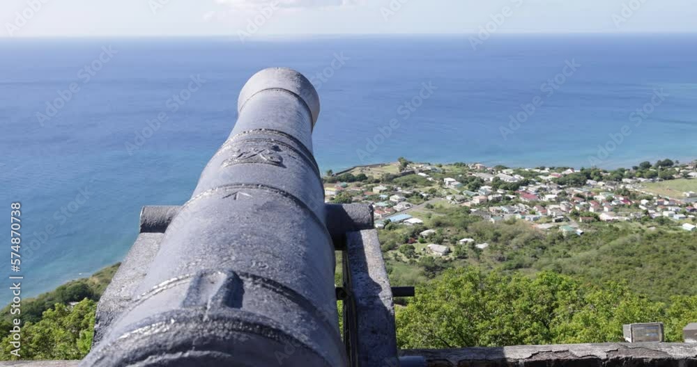 Old canon atop Brimstone Hill Fortress points out toward Sandy Point Town on the island of St. Kitts.